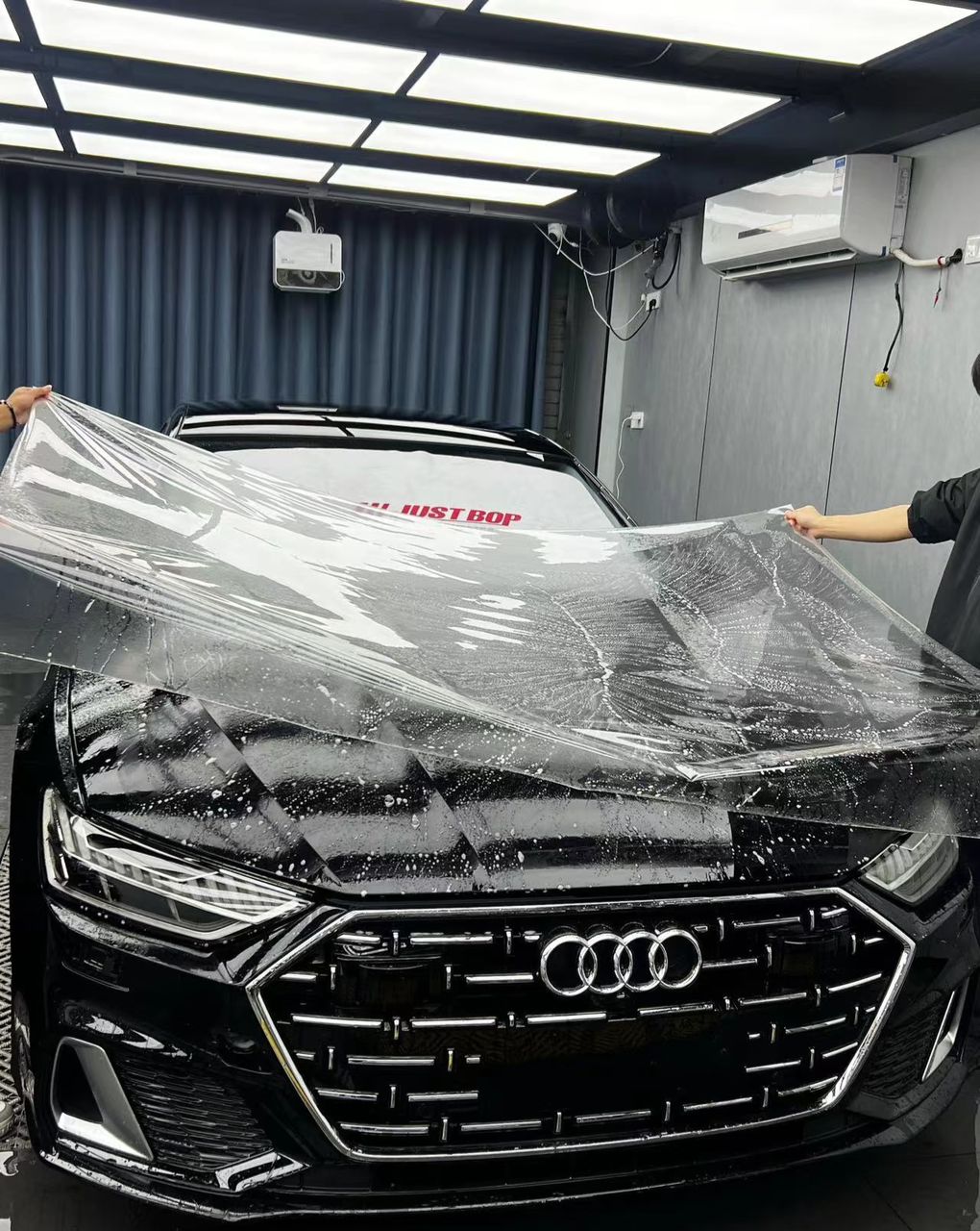 Paint protection film applied to a car